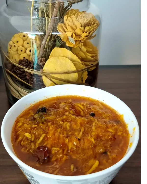 My sweet and tangy Aam ki Chutney, made from grated raw mangoes. I cook it slowly with spices until it has the perfect jam-like consistency. It is made without any vinegar or artificial preservatives.
