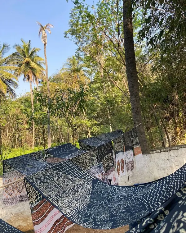 Freshly printed fabrics drying in our garden. The rich indigo and earthy tones are all achieved using natural dyes, a process that is gentle on the planet and beautiful on the cloth.