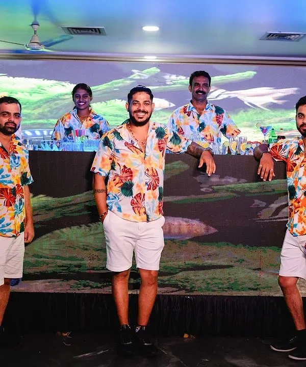 Our team, dressed in vibrant, themed attire for an underwater-themed birthday party. We always dress to match the vibe of your event, ensuring a cohesive and professional look.