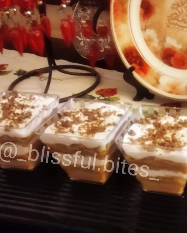My bestselling Banoffee Pie, served in individual dessert cups. These feature layers of banana, cream, and toffee, topped with a sprinkle of chocolate.