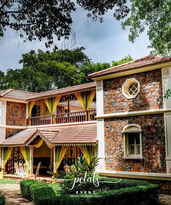 The beautiful heritage venue, Angana the Courtyard, is transformed into a floral wonderland with radiant marigolds and graceful yellow fabric drapings.