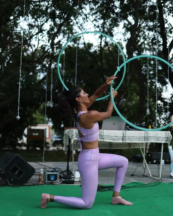 Performing with twin hoops at Zenfest in Hyderabad. I love the challenge and symmetry of working with two hoops at once. This was part of an interactive session where I got the audience to jump and move with me.