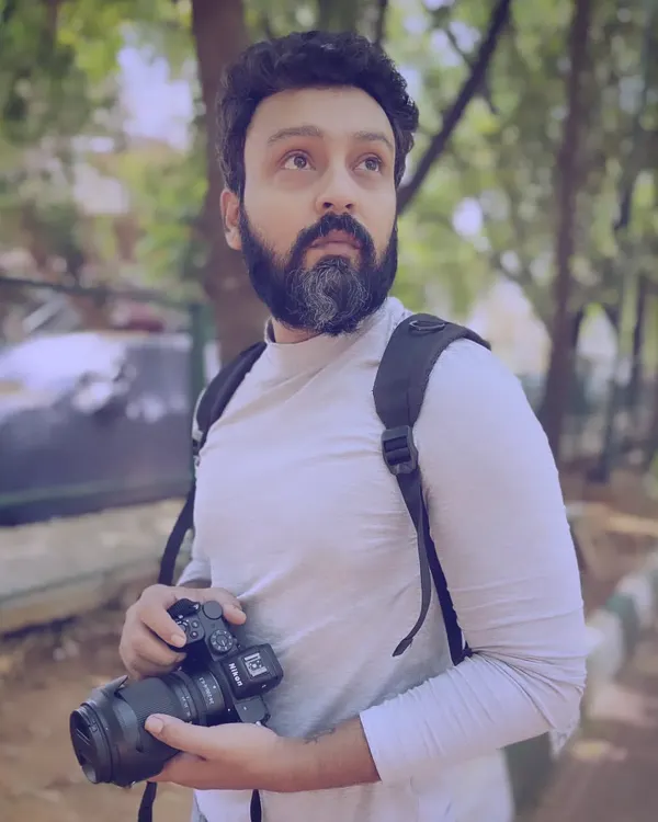 Me and my camera, my favorite conversation partners. This is me in my natural habitat, always looking for the next shot.