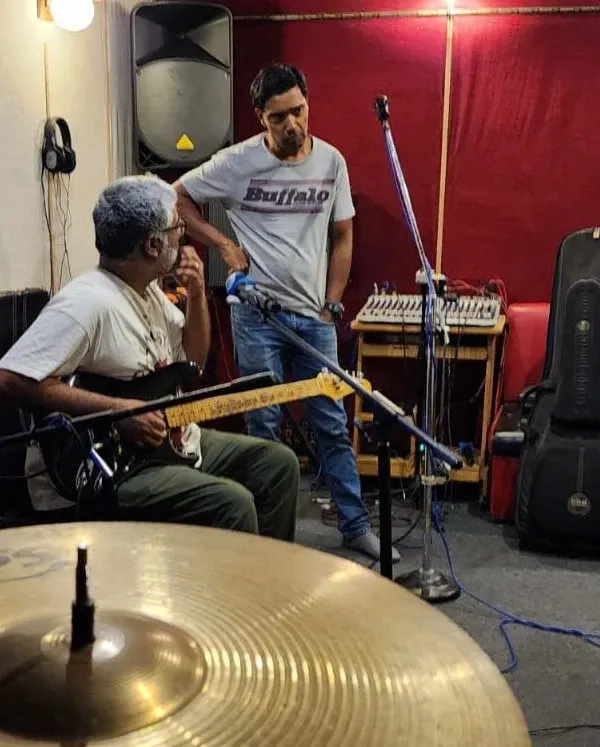 A candid shot from a jam session. This is where the magic happens, figuring out parts and just connecting through the music.