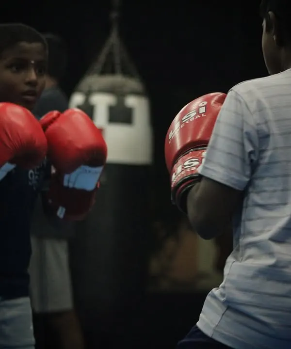 Two of our youngest boxers squaring off. They learn respect and control while developing their fundamental boxing skills.