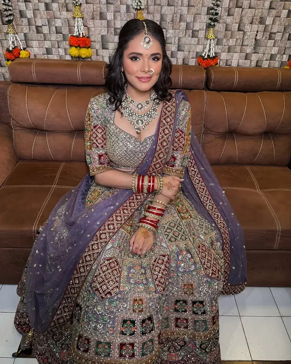 One of my beautiful brides on her wedding day. She looks absolutely radiant in her purple lehenga, and I was so happy to help her find the perfect layered necklace set to complete her look.