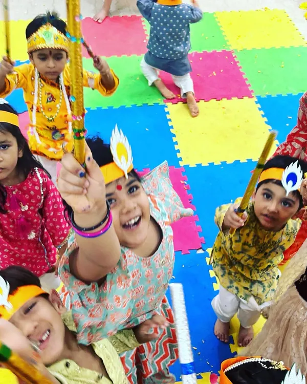 Look at these happy faces during our Janmashtami celebration! I love creating these moments of pure joy where kids can learn about our culture while having a blast with dandiya sticks and colorful traditional outfits. This is what Kids Hive is all about.