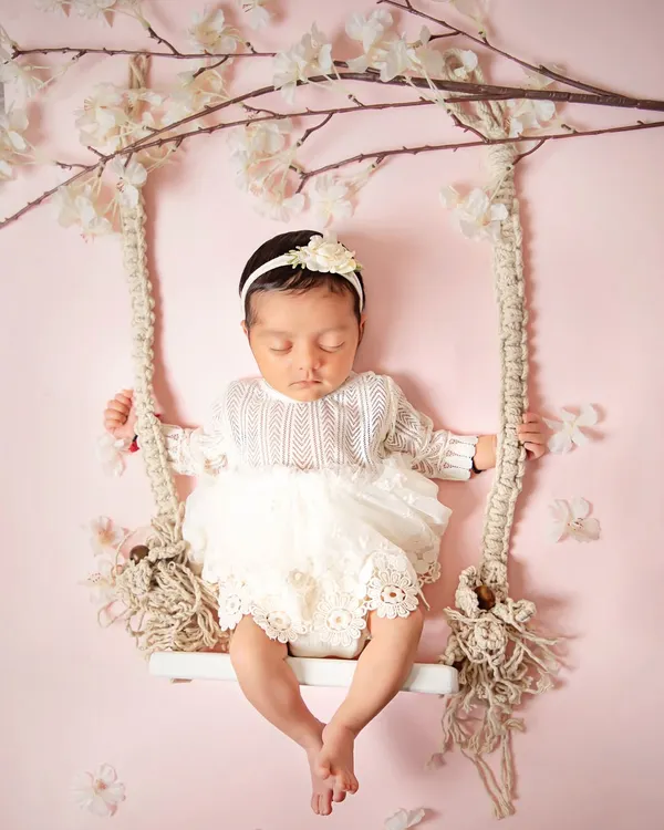 This precious moment is what I love to create. A beautiful, styled portrait of your newborn, sleeping so peacefully, creates a timeless piece of art for your family to cherish forever.