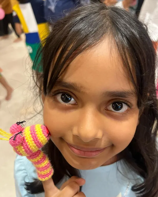 The joy of live reviews from my adorable clients. This little one was so happy with her new finger puppet after the show.