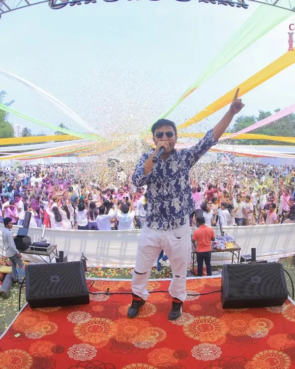 This is the energy I bring to every event. Commanding the stage at a massive Holi festival, connecting with thousands of people, and creating a moment they'll never forget. This is what a high-energy DJ set looks like.