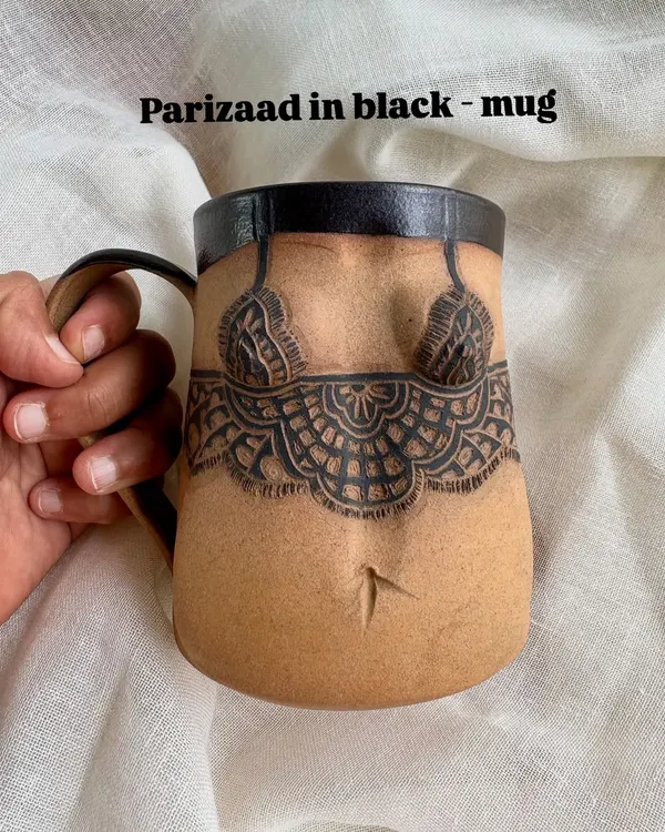 A closer look at the 'Parizaad' mug from my Déesse Collection, featuring detailed sgraffito carving in black. The form is designed to be comfortable to hold, making your daily coffee or tea a unique experience.