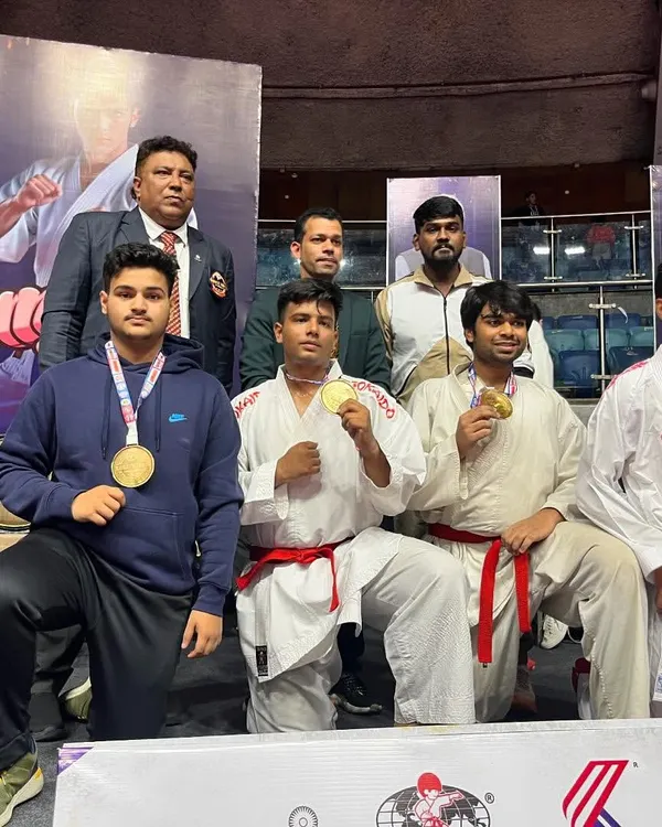 A proud moment with my students, showcasing their gold medals at the Federation Cup. Seeing their dedication rewarded is the greatest satisfaction for a coach.