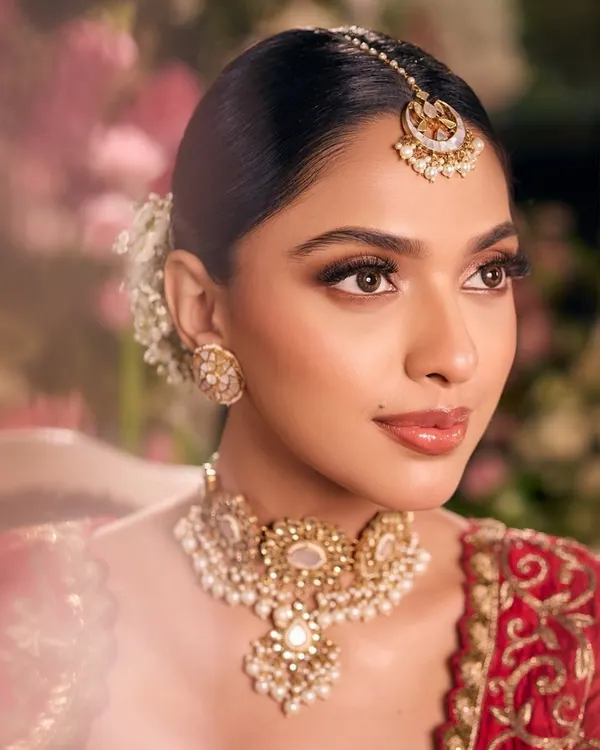 A stunningly detailed close-up from a styled shoot. This image showcases our ability to create flawless, camera-ready skin, perfectly defined eyes, and an overall look of high-fashion elegance.