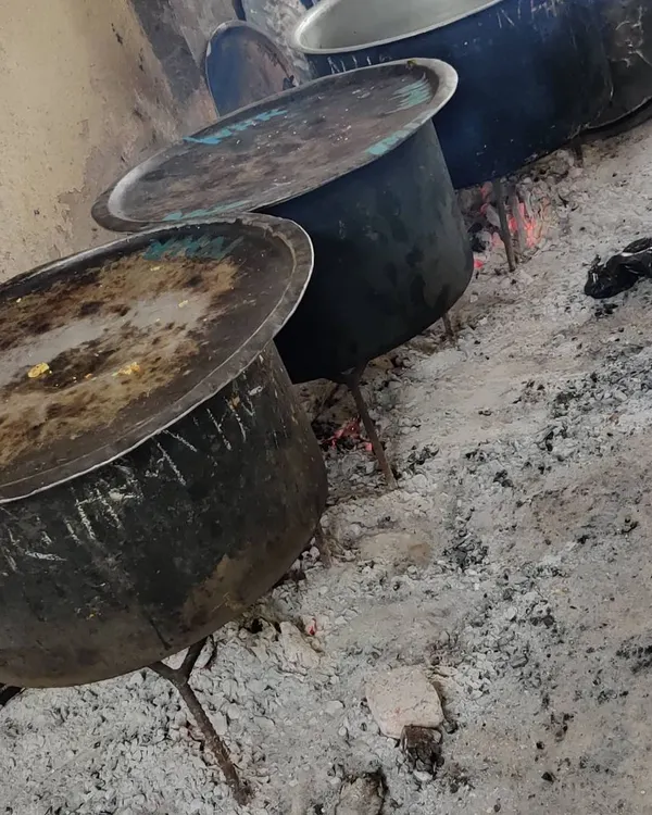 This is how we get the authentic smoky flavor in our dishes. We use traditional large pots, known as 'degs', cooked over open fire, a method we have perfected over the years.