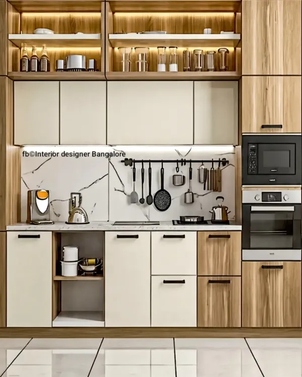 This design features a mix of wood-grain, cream, and glass-front cabinets. The marble backsplash and utensil hanging rod add both luxury and practicality.