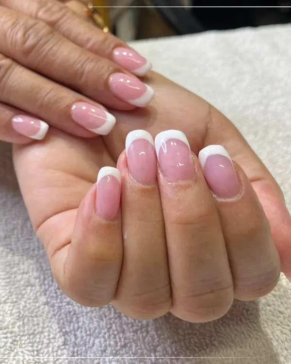 The classic French manicure is timeless for a reason. This clean, elegant look with perfectly shaped tips is one of my most requested styles for its sophisticated and polished finish.