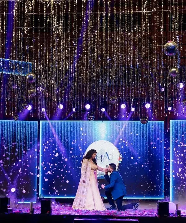 A romantic proposal right in the middle of the Sangeet. I help script these show-stopping moments that make your love story shine on the big stage.