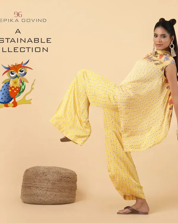 A playful pose in my Owl Collection coordinate set. The earthy yellow Tencel Luxe fabric has a beautiful drape, perfect for the asymmetric hemline of the top and the relaxed fit of the wide-legged pants. This is contemporary fusion wear that tells a story.