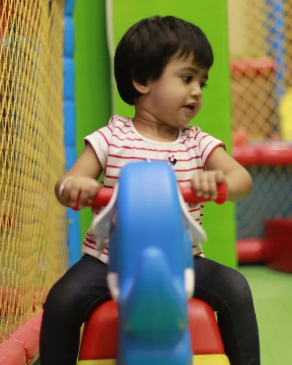 Our toddler area includes fun and safe ride-on toys like this one. It's the perfect spot for our youngest guests to move around and play.