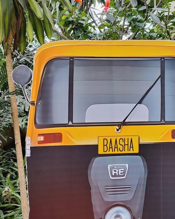 Naan oru dharava sonna, nooru dharava sonna madri! A custom auto rickshaw prop with 'Baasha' on the license plate for a superstar Rajinikanth themed party.