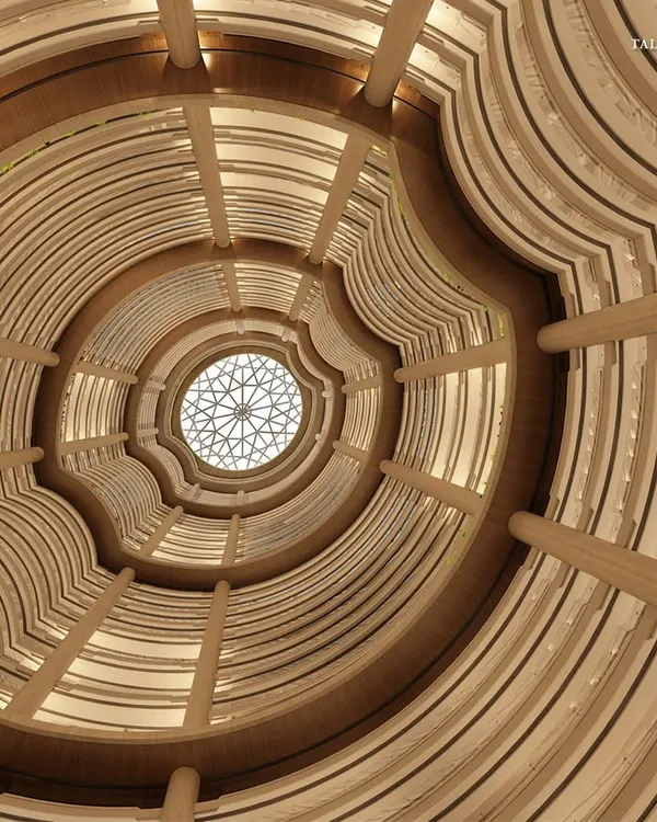 A view from within the heart of Palais Royale, looking up through India’s tallest residential atrium. This 215-meter central void is a feat of structural ingenuity, creating a breathtaking sense of scale and drawing light through the core of the 88-floor tower.