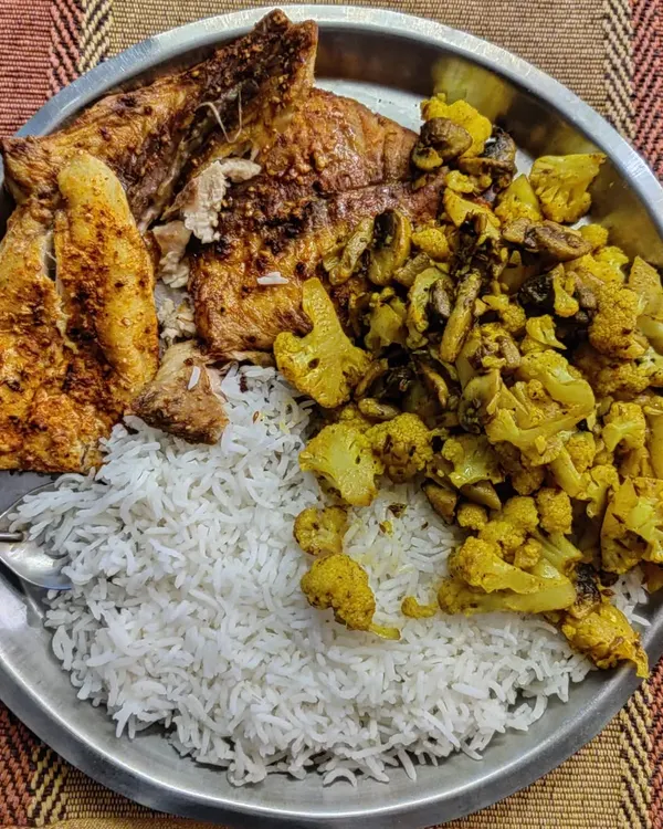 This is the basic framework of a solid meal. Air fried fish for protein and omega 3s, steamed rice for easily digestible carbs, and sauteed vegetables for vitamins and minerals.