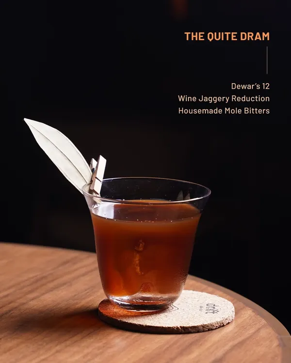 From our Dewar's 12 menu, The Quite Dram. A smoky, warm pour featuring wine jaggery reduction and our house-made mole bitters for a complex finish.