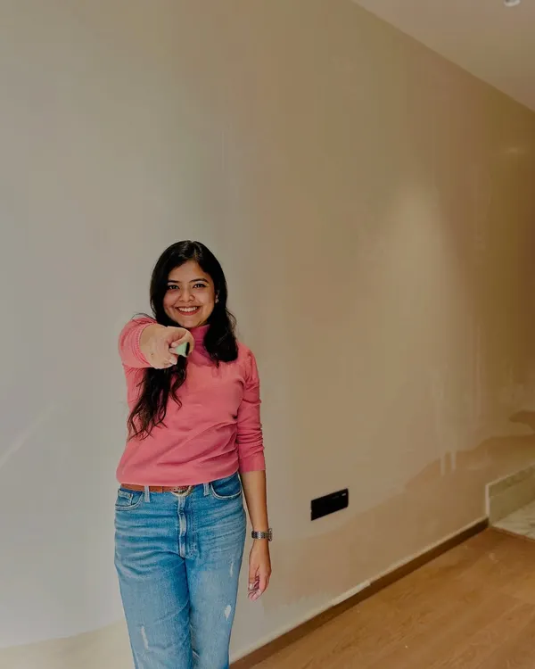 Every time I see a bare wall, I see a world of possibilities. This is the moment of excitement before the first stroke of paint.