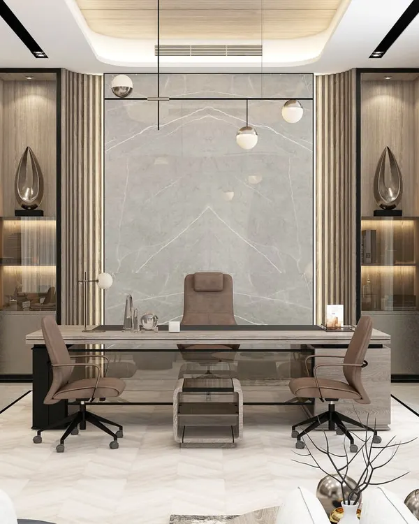 A luxurious CEO's cabin featuring a large executive desk, marble accent wall, and integrated display shelving, designed to make a powerful statement.