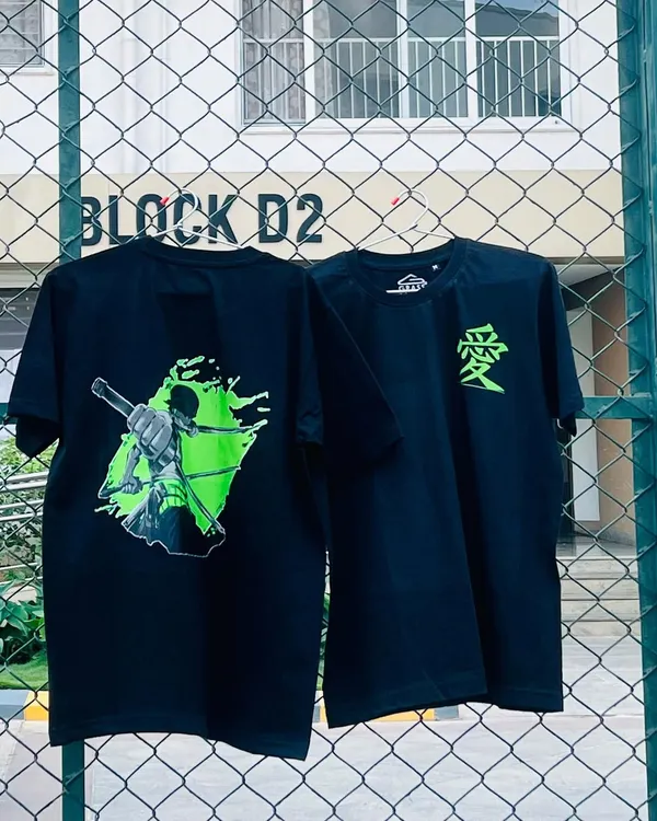 This is one of my favorite custom T-shirt orders, featuring a vibrant anime design. I offer printing on both the front and back, so you can have a small detail like the Japanese symbol for "love" on the front and a full graphic on the back, as shown here.