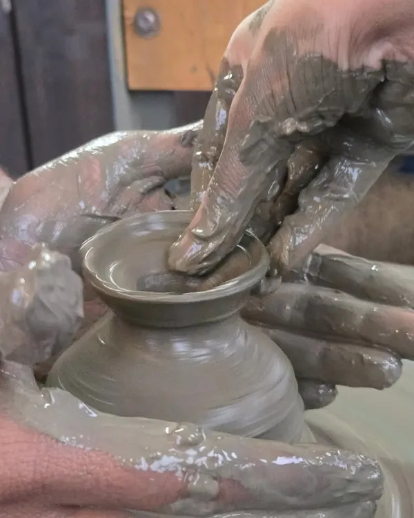 This is the heart of pottery. The feeling of wet clay spinning under your hands is something you have to experience. I guide everyone through the process of shaping their very first pot.