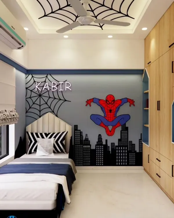 With great power comes a great bedroom. This Spiderman-themed room features a city skyline mural and a custom neon name sign for our little superhero.