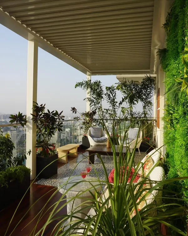 This is a full view of our Pioneer Araya project, showcasing a spacious terrace designed for luxury living. The covered pergola, vertical garden, and carefully selected plants create a private escape with an incredible city view.