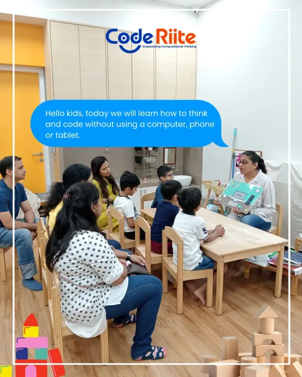 A typical start to one of my sessions. I gather the children and parents to explain that we're about to learn coding without any computers, phones, or tablets. It sets the stage for a session of pure, hands-on, brain-building fun.