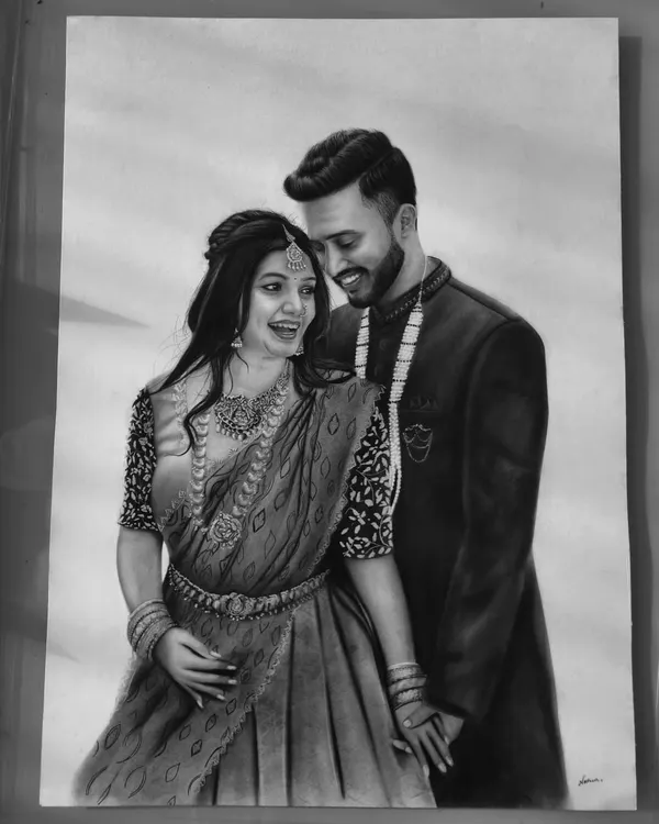 A finished A2 size wedding portrait, capturing the couple in a moment of candid joy. I spent over 27 hours on this piece, focusing on the intricate details of the bride's saree and jewelry.