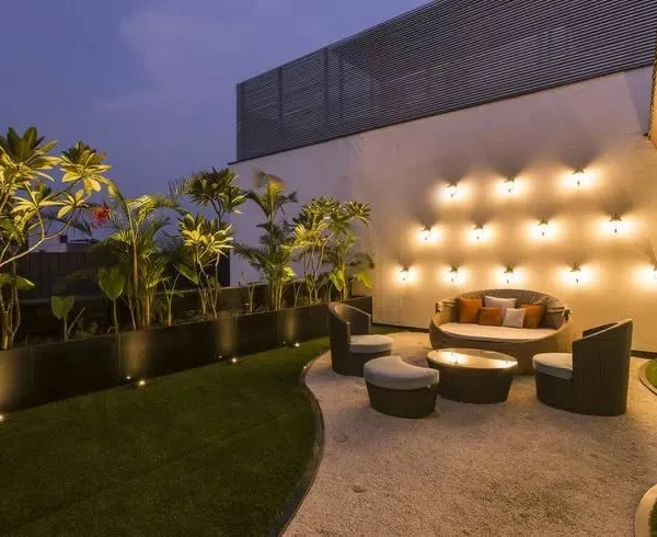 This is what I love to do: transform an empty terrace into a luxurious evening retreat. I combined a soft artificial lawn with a custom seating area and strategic lighting to create a perfect spot for relaxing or entertaining.