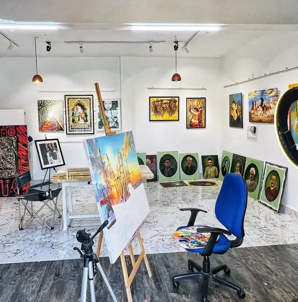 A wide view of my studio, Kamil's Art Studio. This is my dream space, filled with completed works, works in progress, and all my tools.