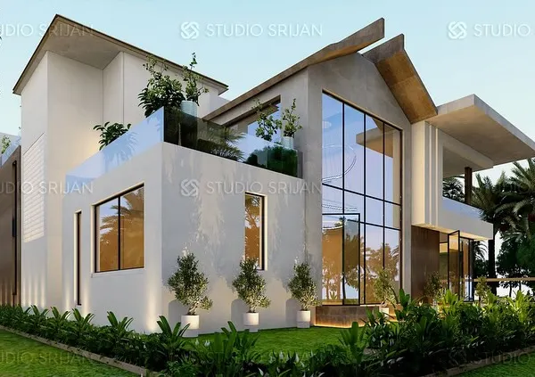 A 738 sq. yard villa designed for a client in Coimbatore. This view highlights the double-height glass walls and asymmetrical rooflines, creating a dynamic structure that embraces natural light and its green surroundings.