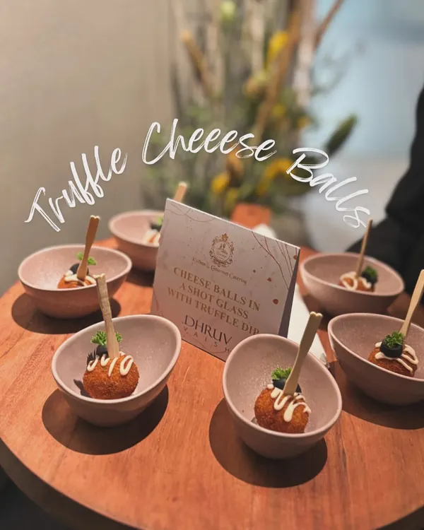 Truffle Cheese Balls served in individual bowls with a truffle dip. This was part of a bespoke menu I created for a collaboration with luxury designer Dhruv Vaish.