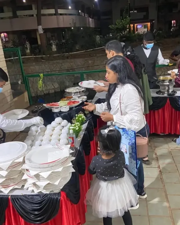 A candid shot from a birthday party we catered for 130 guests. Our team ensures the buffet line is always stocked and tidy, allowing guests of all ages to enjoy the food without any fuss.