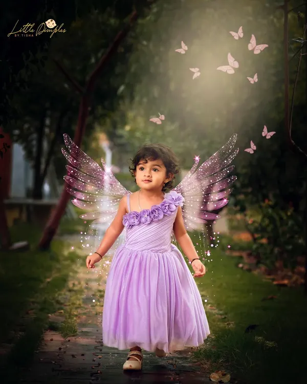 A little fairy in an enchanted wood. I use creative editing to add magical elements like glowing butterflies to make dreams a reality.