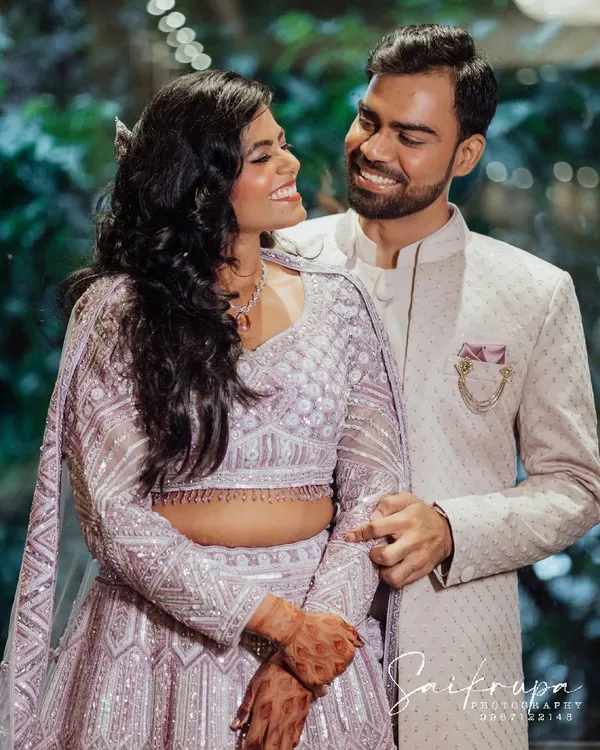 A classic, happy portrait where the couple's easy chemistry shines through. My goal is to make you feel comfortable so your natural smiles are what we capture.
