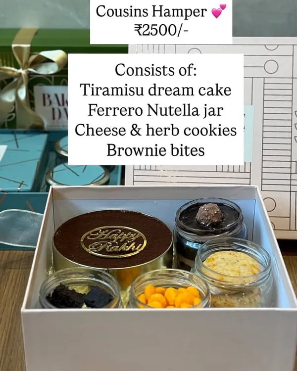 The Cousins Hamper menu. This popular Rakhi option includes a Tiramisu dream cake, Ferrero Nutella jar, cheese and herb cookies, and brownie bites.