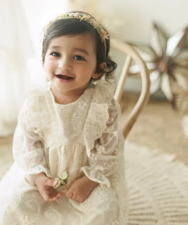 Isn't she adorable? This little girl's first birthday milestone session was full of sweet smiles. I love creating these classic, timeless portraits to celebrate such a special occasion.