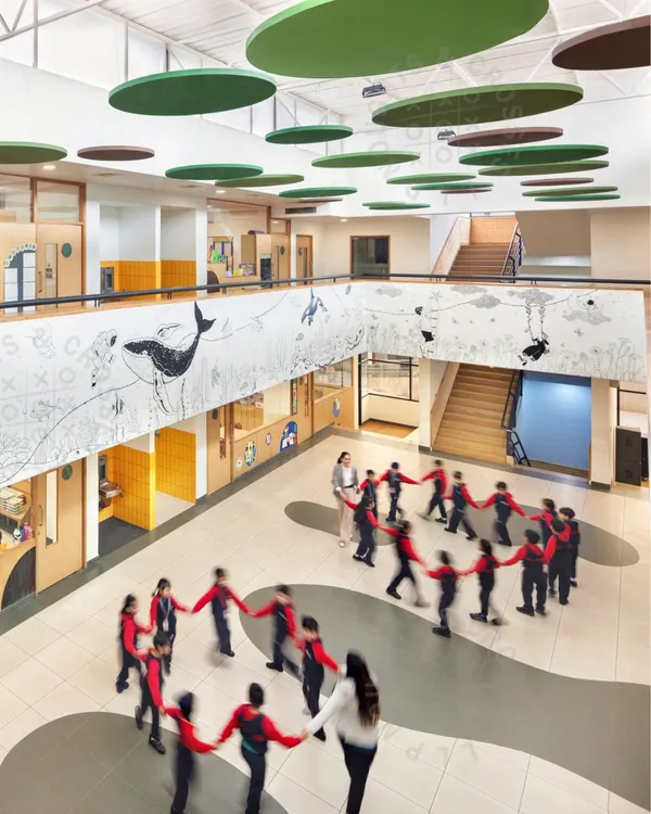 We transformed the central atrium at GD Goenka Public School into a vibrant hub for learning and play. This double-height space, filled with natural light and playful design elements, encourages movement and interaction, proving that the most important learning often happens outside the classroom.