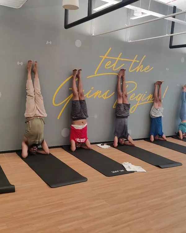 A corporate wellness session at LinkedIn where we worked on wall-supported headstands. It was amazing to see the team support each other and have fun while trying something new.