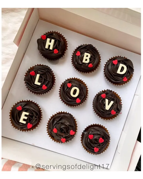 A simple and sweet way to say it all. These are my double chocolate cupcakes, customized with "HBD LOVE" for a special birthday celebration. You can get any message you like!