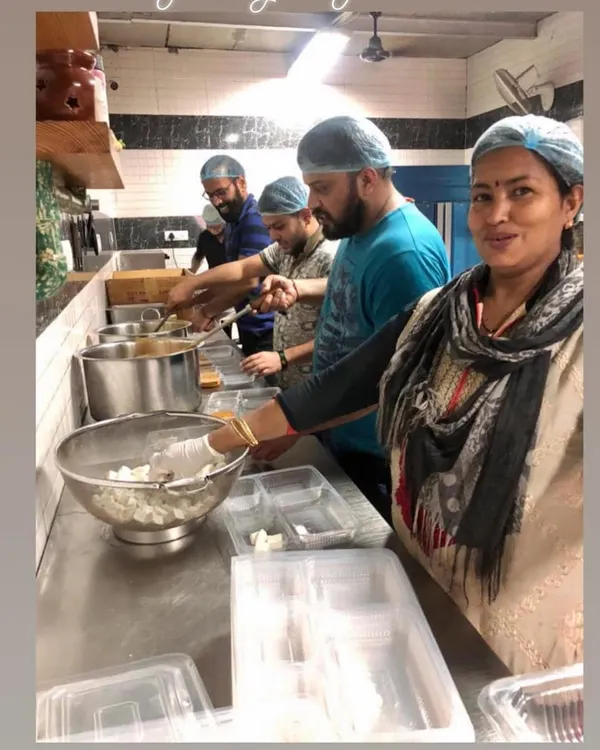 Happy Women's Day to the incredible women on my team. Here they are, working hard in the kitchen, preparing for an event with smiles on their faces.