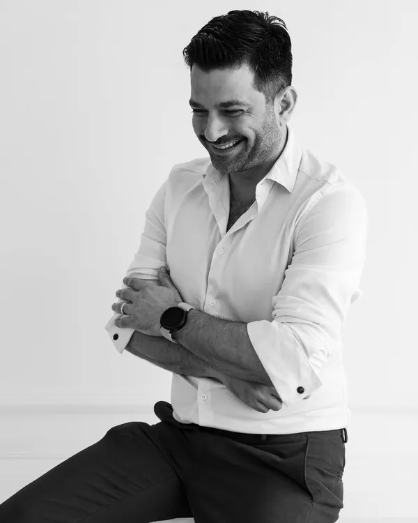 A black and white portrait. I believe a smile and a positive attitude are just as important in design as a sharp pencil.