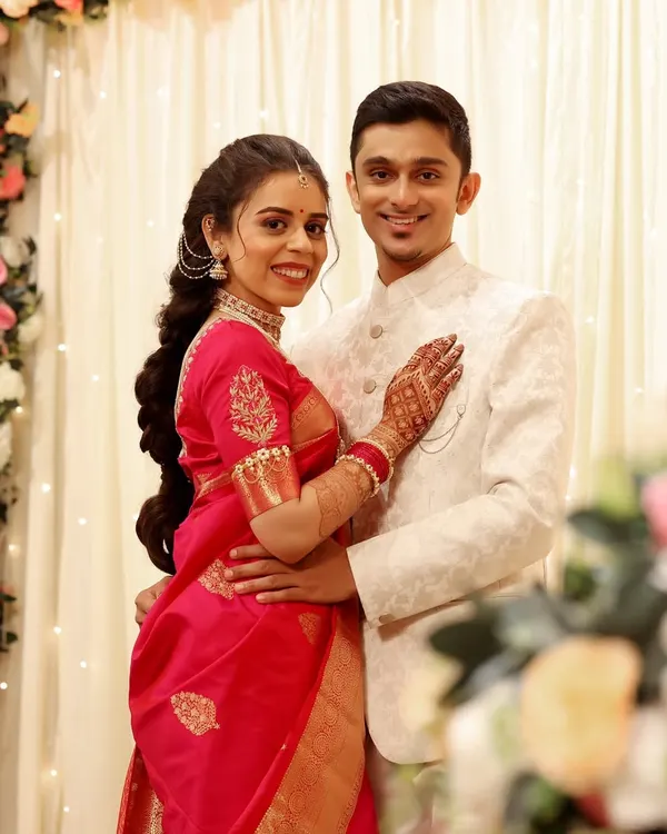 A classic engagement portrait for Jui and Parth. I created a soft, romantic look for the bride with a beautiful braided hairstyle that perfectly complements her pink saree.